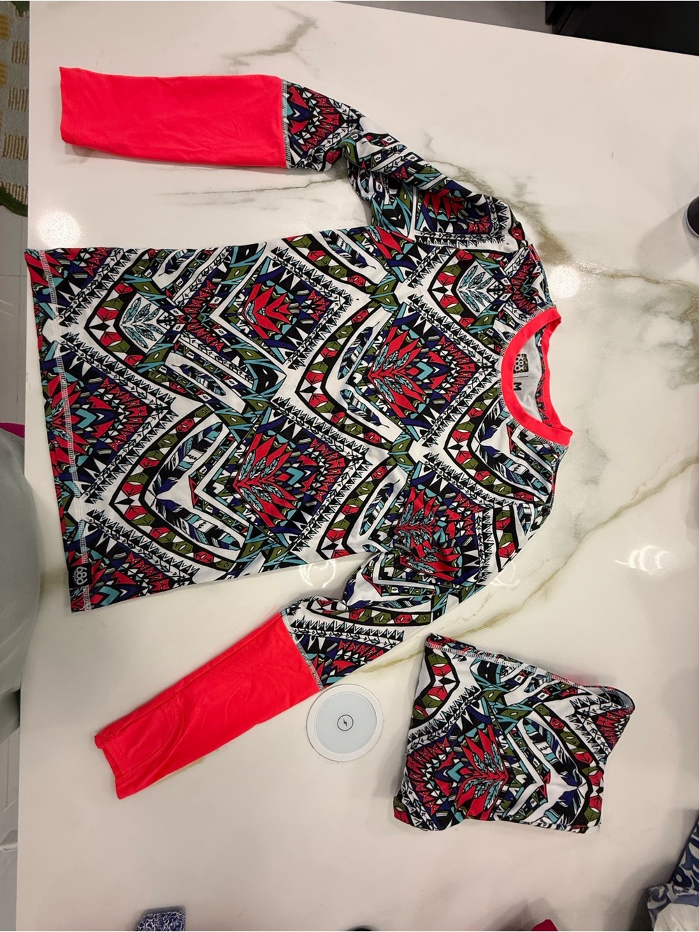 686 Women's Long Sleeve Geometric Rash Guard in Neon Coral and Multi